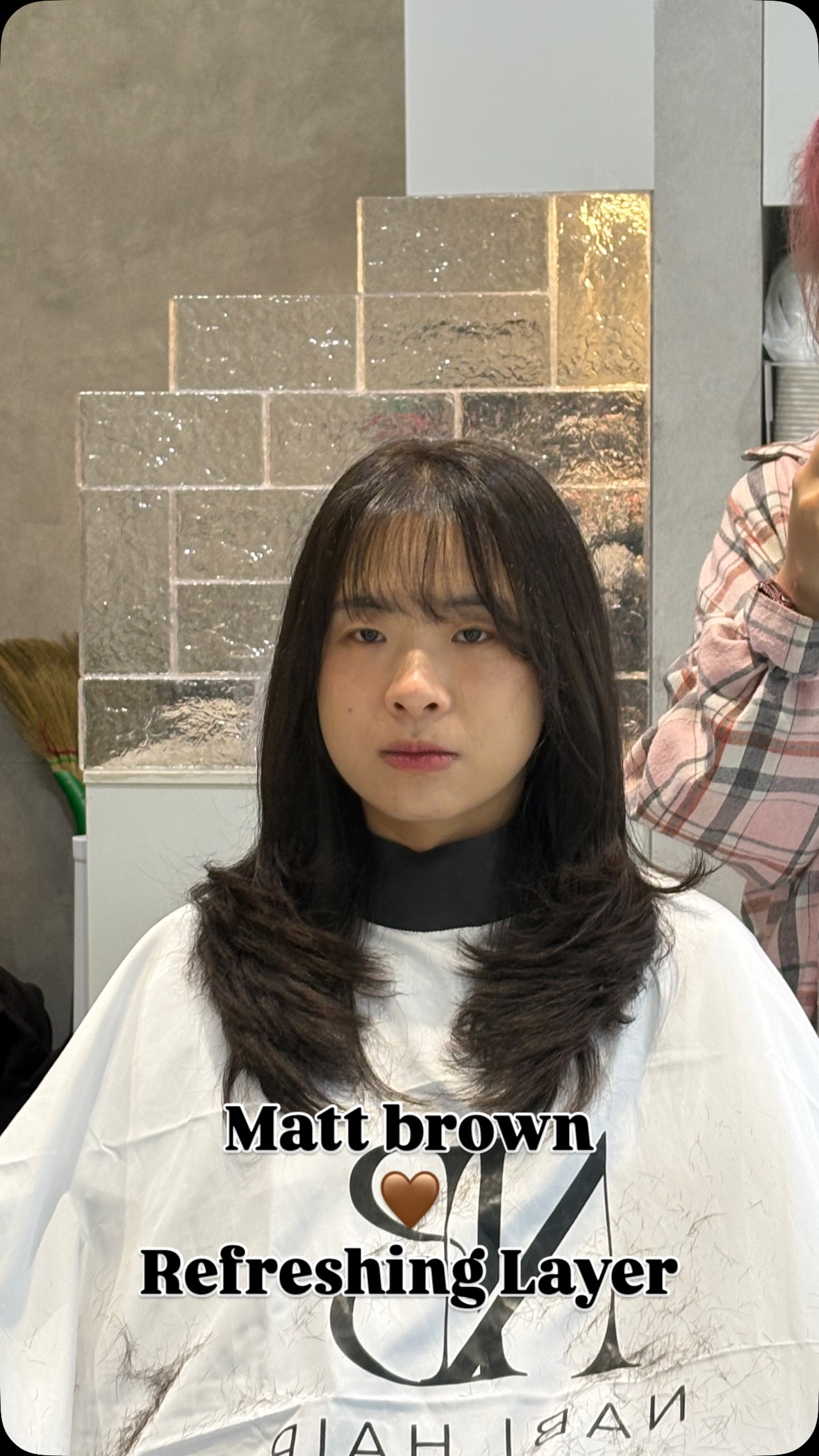 Matt brown colour and layered cut